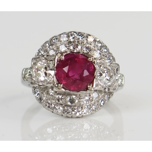 138 - Natural Burmese Ruby and Diamond Cluster Ring in a platinum setting. Sold with GCS certificate stati... 