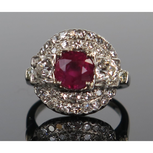 138 - Natural Burmese Ruby and Diamond Cluster Ring in a platinum setting. Sold with GCS certificate stati... 