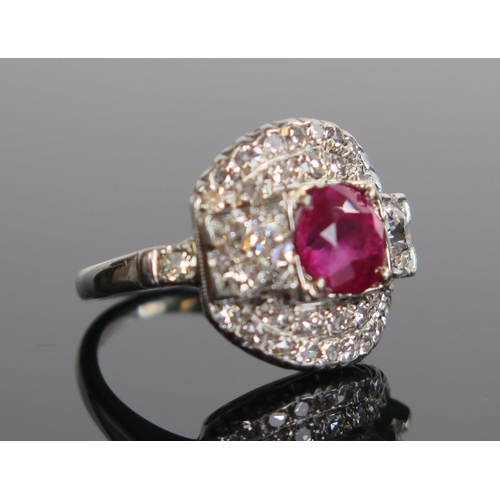 138 - Natural Burmese Ruby and Diamond Cluster Ring in a platinum setting. Sold with GCS certificate stati... 