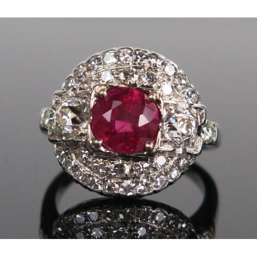 138 - Natural Burmese Ruby and Diamond Cluster Ring in a platinum setting. Sold with GCS certificate stati... 