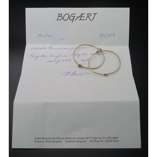 142 - A Pair of 18ct Gold Bangles with knotted decoration, 10.5g. Sold with André Bogaert insurance valuat... 