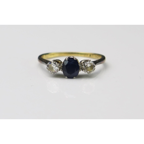 156 - Sapphire and Diamond Three Stone Ring in an 18ct gold and platinum setting, c. 6.3x5mm sapphire and ... 