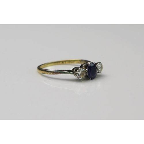 156 - Sapphire and Diamond Three Stone Ring in an 18ct gold and platinum setting, c. 6.3x5mm sapphire and ... 