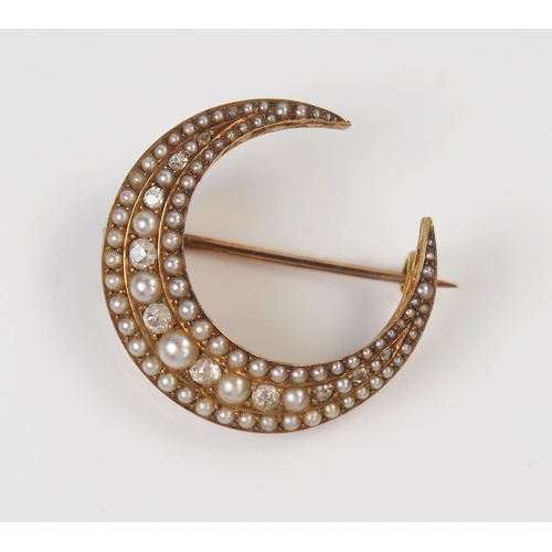 16 - Antique Pearl and Old Cut Diamond Crescent Brooch in a high carat gold setting, largest pearl 3.5mm,... 