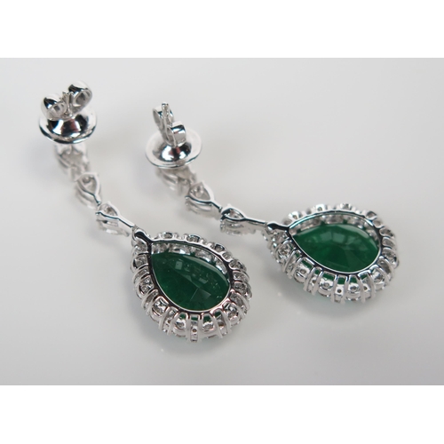 173 - Pair of 18ct White Gold, Emerald and Diamond Pear Drop Pendant Earrings, 13x9.5mm emeralds, c. 33mm ... 