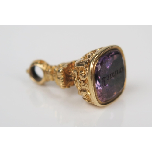 175 - Unmarked Gold Seal Fob with amethyst matrix engraved Caroline, 26mm high, 5.8g