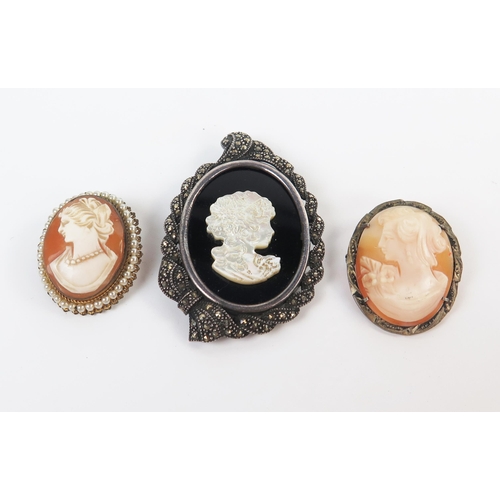 226 - Mother of Pearl and Marcasite Cameo Pendant Brooch (59x40mm) and two shell cameo brooches