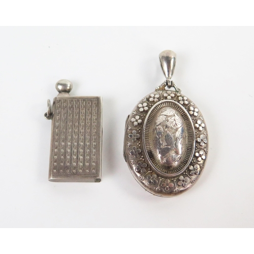 227 - Victorian Silver Locket (c. 57mm drop, Birmingham 1884) and silver lighter