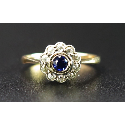 229 - Antique Sapphire and White Stone Cluster Ring in an unmarked gold setting, 9mm head, size K.25, 1.4g