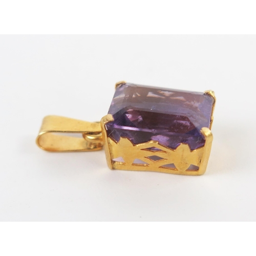 242 - Amethyst Pendant in an unmarked high carat gold mount, 21mm drop, 2.4g