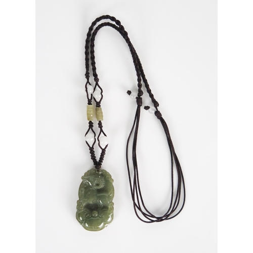 295 - Chinese Carved Jadeite Necklace decorated with a ram, 38mm drop