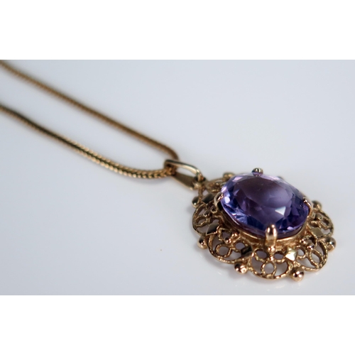 370 - 9ct Gold and Amethyst Pendant on chain, 29mm drop, 5.6g