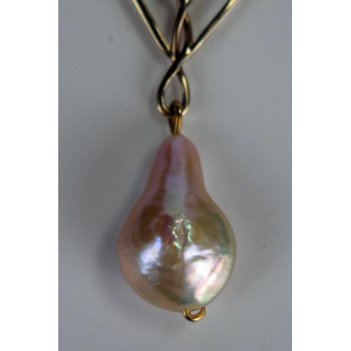 376 - Art Nouveau Style Baroque Pearl and Black Opal Pendant in a hallmarked 9ct gold setting, 21.77