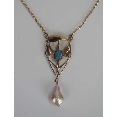 376 - Art Nouveau Style Baroque Pearl and Black Opal Pendant in a hallmarked 9ct gold setting, 21.77