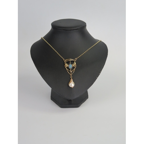 376 - Art Nouveau Style Baroque Pearl and Black Opal Pendant in a hallmarked 9ct gold setting, 21.77