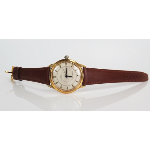 424 - CYMA Gent's Gold Plated Wristwatch, 34mm case with automatic bumper movement. Running