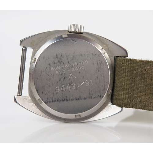 435 - MWC British Military Wristwatch, the 35.5mm case back no. 6BB-6645-99 523-8290, military crows foot ... 