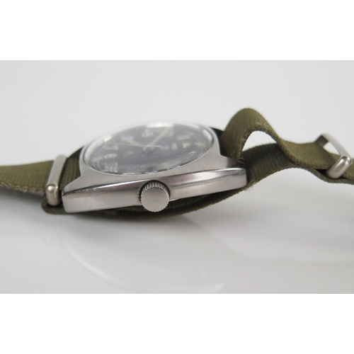 435 - MWC British Military Wristwatch, the 35.5mm case back no. 6BB-6645-99 523-8290, military crows foot ... 