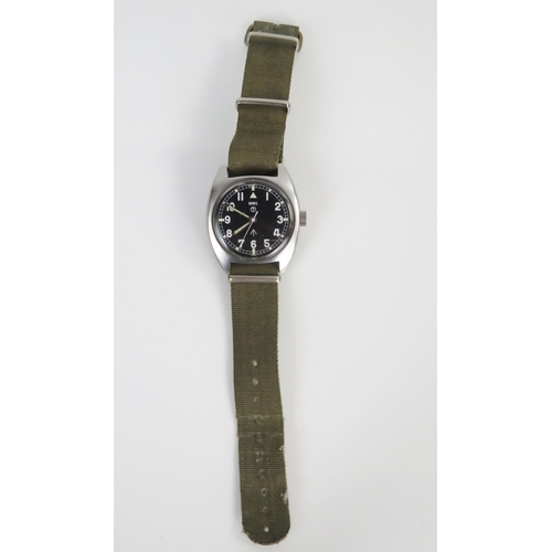 435 - MWC British Military Wristwatch, the 35.5mm case back no. 6BB-6645-99 523-8290, military crows foot ... 