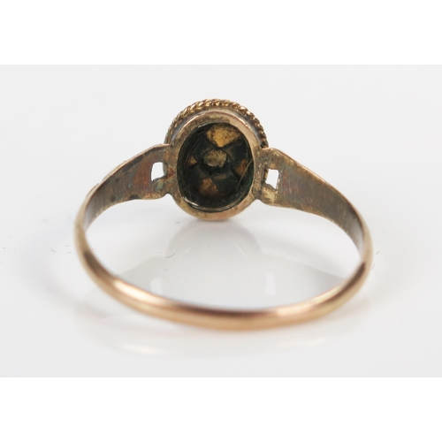 48 - Georgian Memorial Ring with black enamel and pearl decoration in an unmarked yellow metal setting, s... 