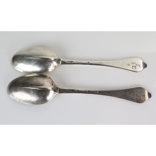 512 - A pair of Queen Anne silver table spoons,  dog nose stem, rat tail bowl, owners initials F over I.E,... 