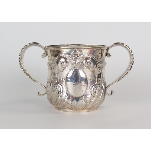 513 - A George II silver porringer, cast handles with bead decoration, Exeter 1738, unidentified maker 