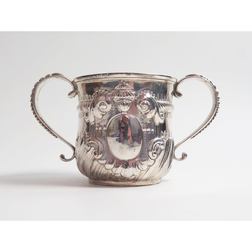 513 - A George II silver porringer, cast handles with bead decoration, Exeter 1738, unidentified maker 