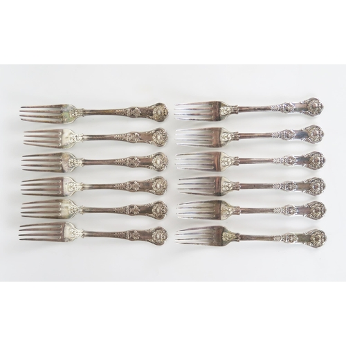 543 - Twelve George IV silver table forks, Queens Pattern, London 1823,  William Traies, some rubbing, pro... 