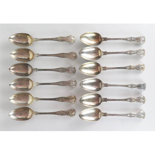 545 - Twelve Victorian silver table spoons, Kings Pattern, London 1874, George Adams, 1250 grams approxima... 