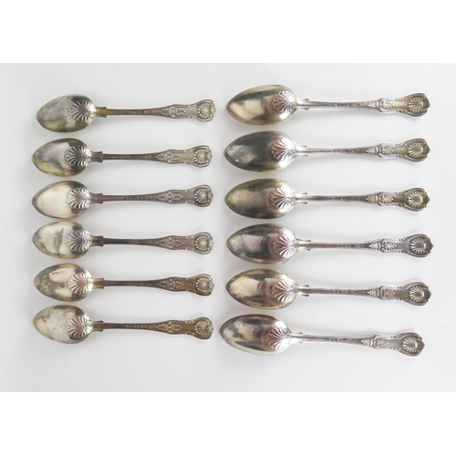 545 - Twelve Victorian silver table spoons, Kings Pattern, London 1874, George Adams, 1250 grams approxima... 