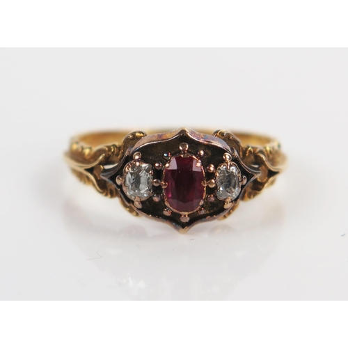 55 - Antique Ruby and Old Cut Diamond Ring in an unmarked high carat gold setting with foliate shoulders,... 