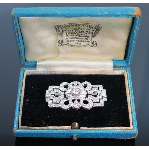 56 - Art Deco Diamond Brooch set with round and baguette cut stones in an unmarked platinum? setting, 42x... 