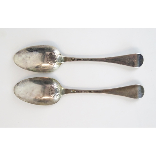 563 - A pair of George II silver table spoons, shell back bowl, engraved crest,  London 1758?, Richard Gos... 