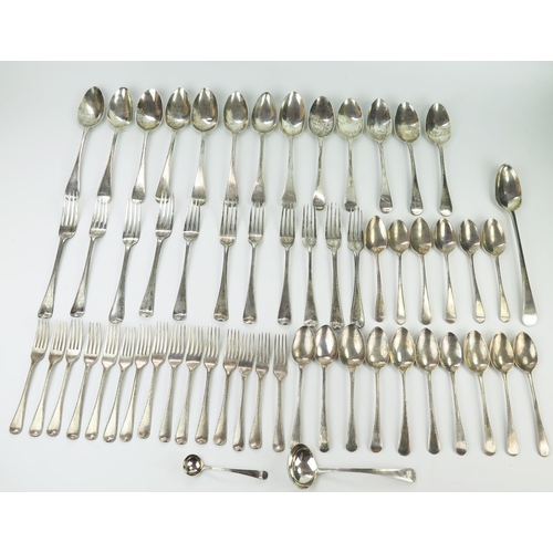 569 - A Georgian silver matched canteen of flatware, Old English Pattern, bright cut decoration, comprisin... 