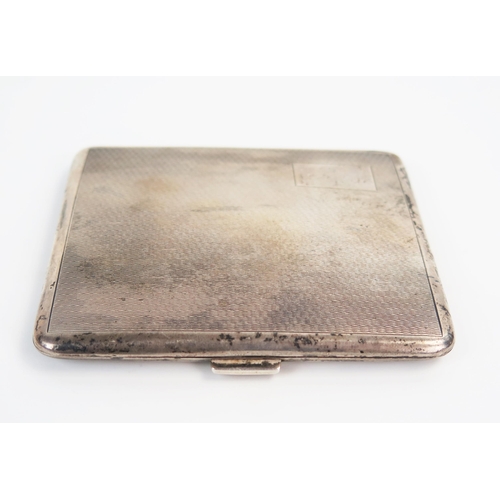 576 - A silver cigarette case, Birmingham 1922,  William Neal and Son, 8x7cm, 75grams.