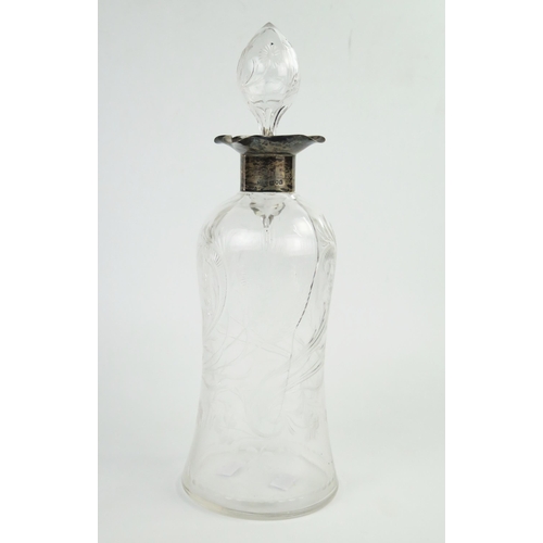 580 - An Edwardian carved glass and silver whiskey decanter and stopper, of wasted bottle form,  Birmingha... 