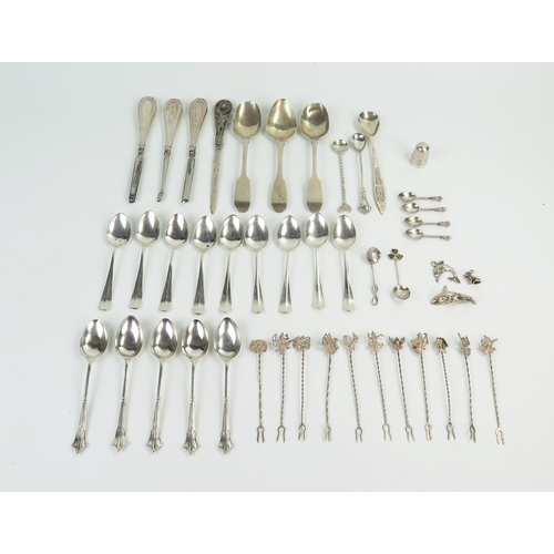 590 - A mixed lot of nine coffee spoons, five teaspoons, three fiddle pattern teaspoons, eleven white meta... 