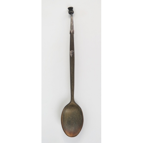 596 - Scottish interest, a horn and silver spoon, with a thistle finial, 16.5cm.