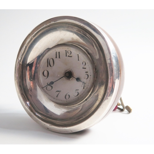 605 - An Edwardian silver and oak case travel watch, circular concave frame, oak back, bulls eye glass, pl... 