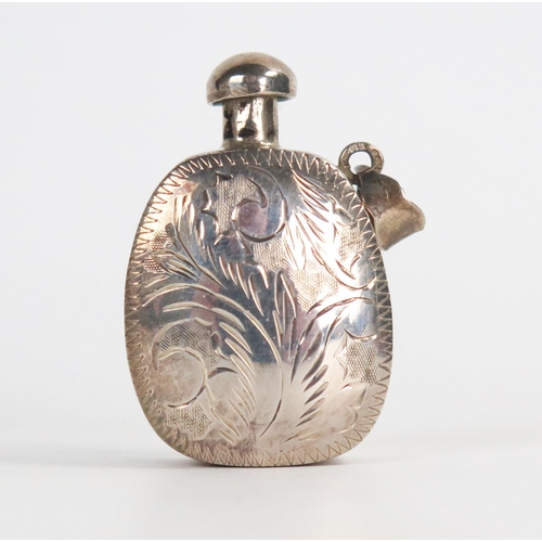 611 - A small white metal snuff bottle, probably Chinese, not marked, 4cm, 8grams.