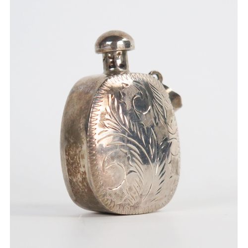 611 - A small white metal snuff bottle, probably Chinese, not marked, 4cm, 8grams.