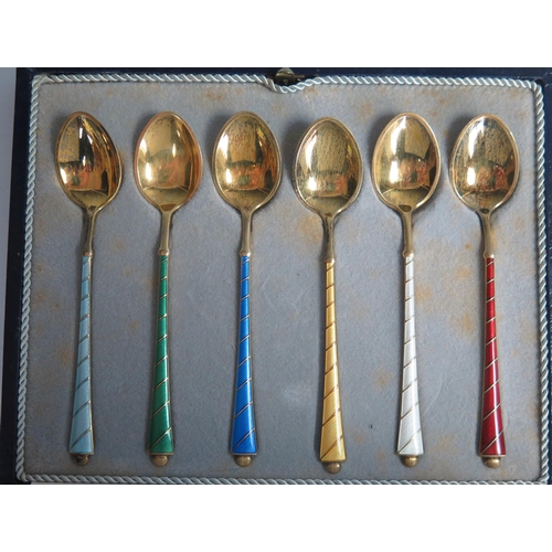 615A - Liberty Cased Set of Six Silver Gilt and Harlequin Enamel Coffee Spoons, 47.5g