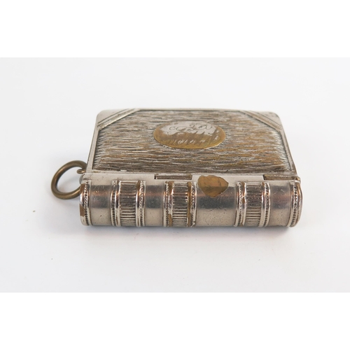 618 - A early 20th Century novelty silver plated vesta/ stamp case.