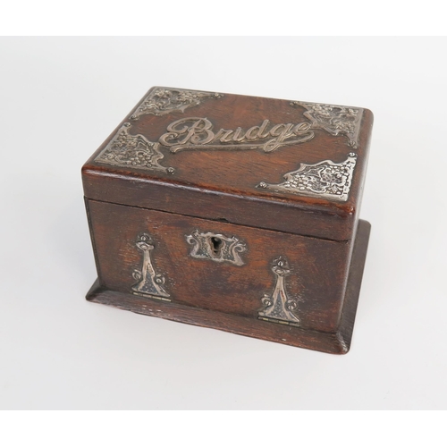 623 - An Arts and Crafts silver and oak card box for Bridge, of rectangular form, silver mounts Birmingham... 