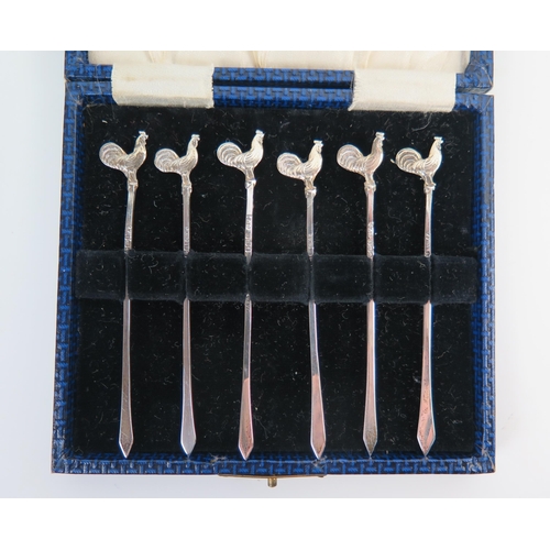 635 - A cased set of six silver cocktail sticks, Sheffield 1905.