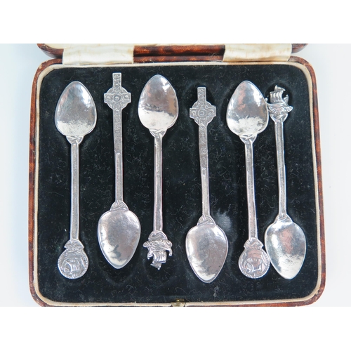 645 - A set of six Arts and Crafts Celtic teaspoon, Chester 1937, Stienhart and Co., cased.