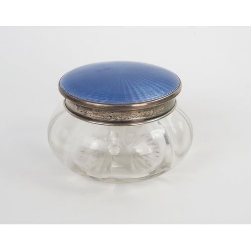 653 - A blue guilloché enamel silver top glass powder bowl, Birmingham 1928, 6cm high.