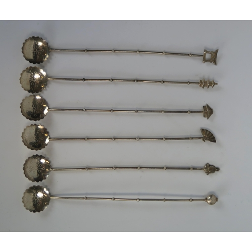 670 - Set of Six Oriental White Metal Long Stemmed Spoons with pagoda, fan, Buddha and other finials, 43.9... 