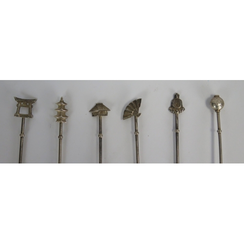 670 - Set of Six Oriental White Metal Long Stemmed Spoons with pagoda, fan, Buddha and other finials, 43.9... 