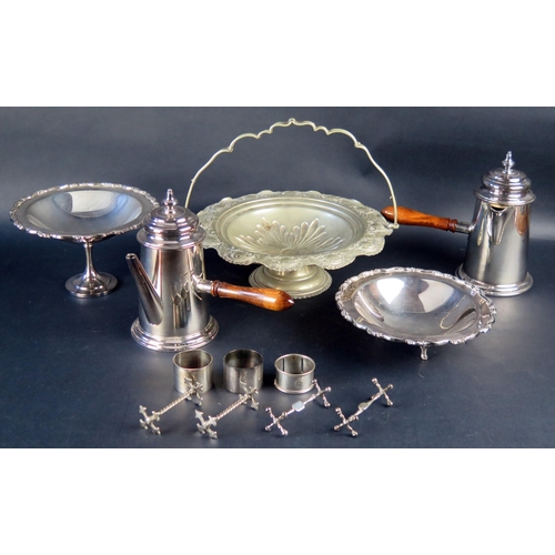 694 - A Selection of Silver Plate including a pair of chocolate pots, tazza with matching bowl, napkin rin... 